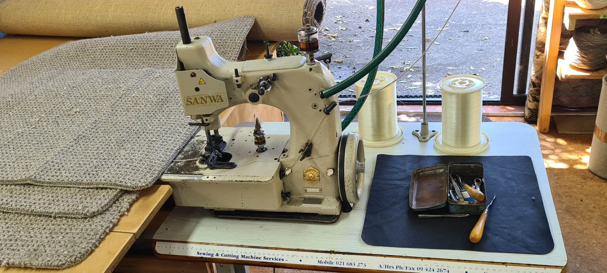 Sanwa industrial carpet overlocking machine in North Shore workshop