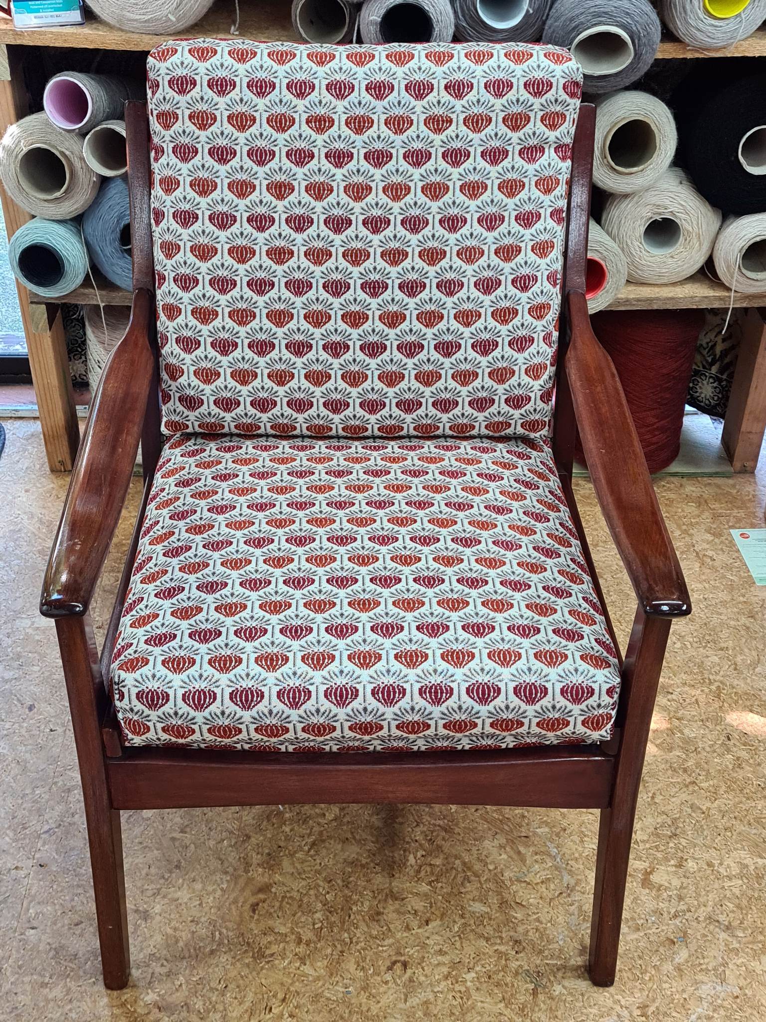 Mid-century armchair recovered in new fabric
